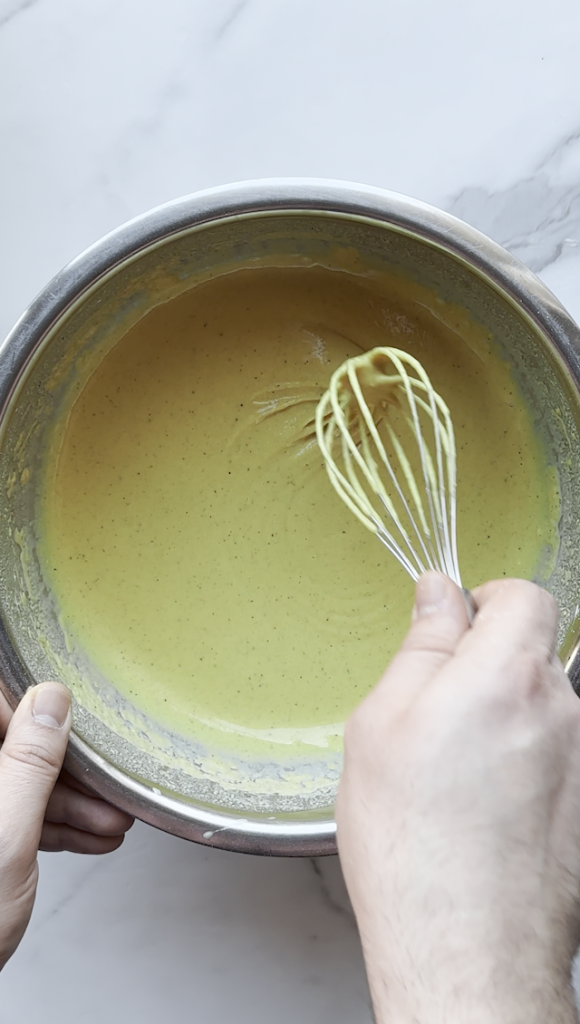 a bowl of batter for Afghan Pakawra